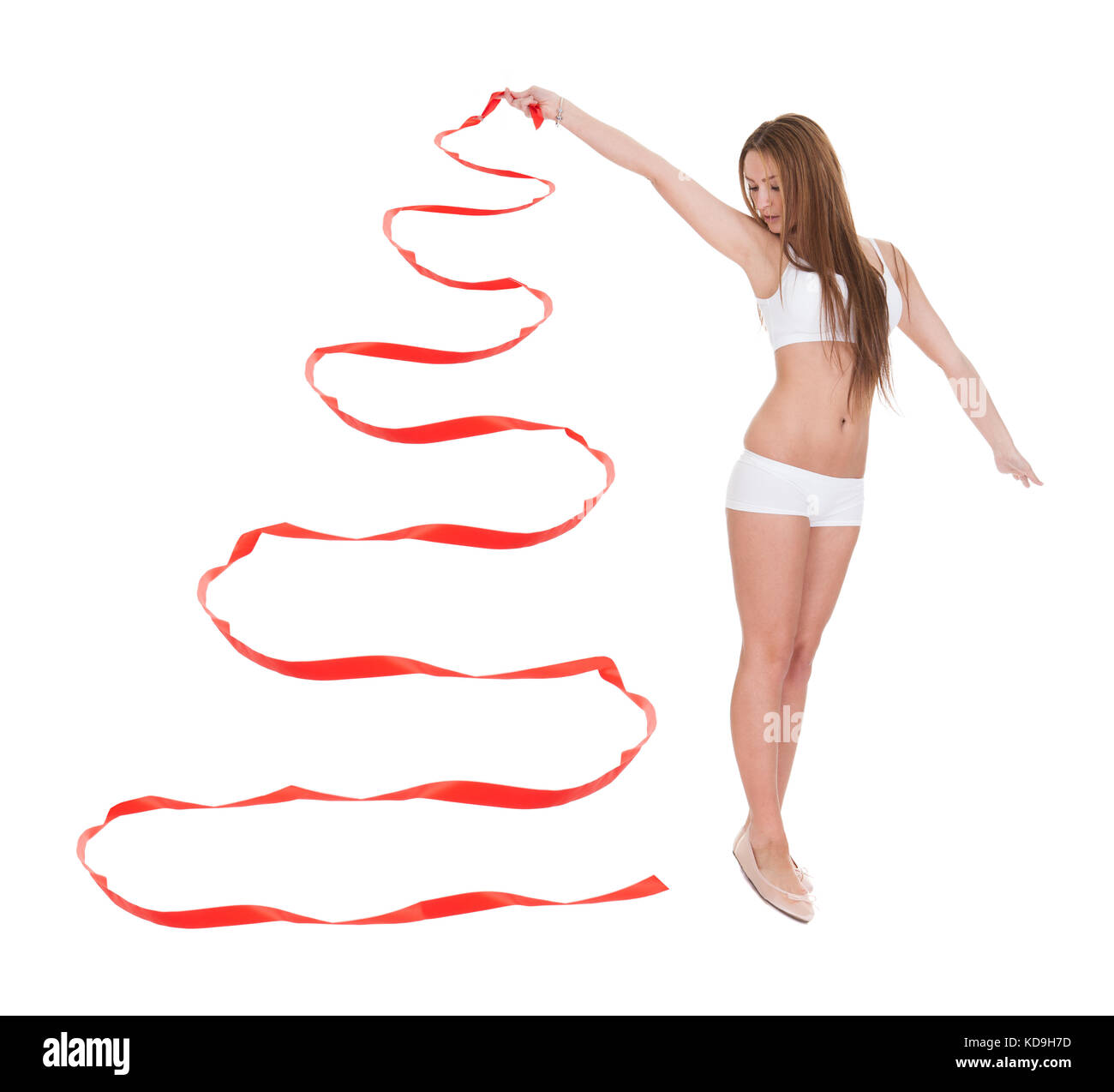 Junge Frau mit rotem Band. Isolated On White Stockfoto