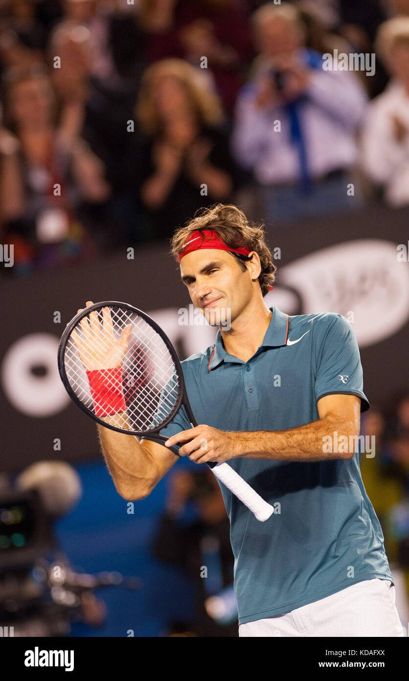 Roger Federer (SUI) konfrontiert j.w. Tsonga (fra) in der vierten Runde der Australian Open 2014 Männer singles. Als Grudge Match in Rechnung gestellt, Federer leicht Mo Stockfoto