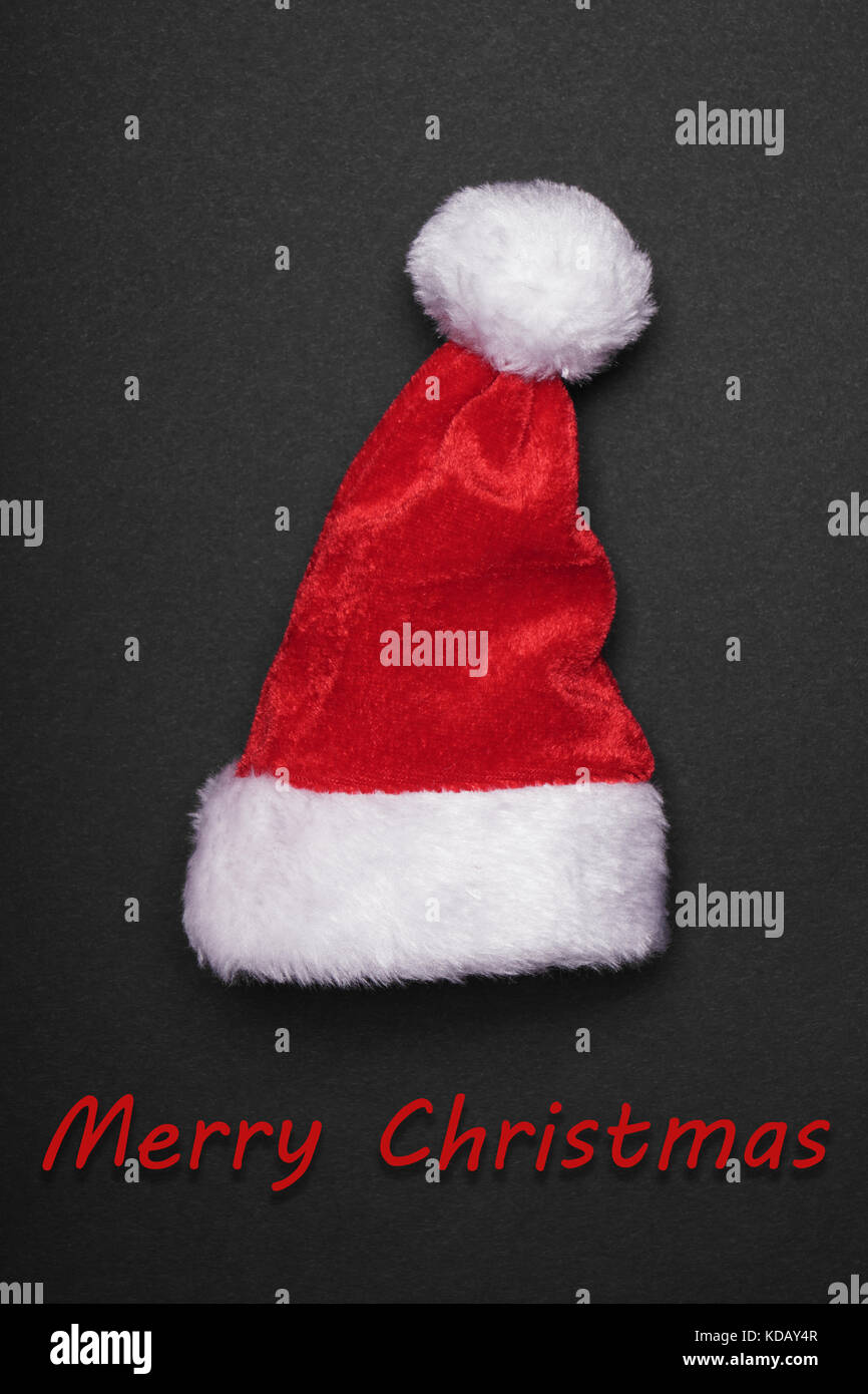 Santa claus Hut mit frohe Weihnachten Gruß Stockfoto