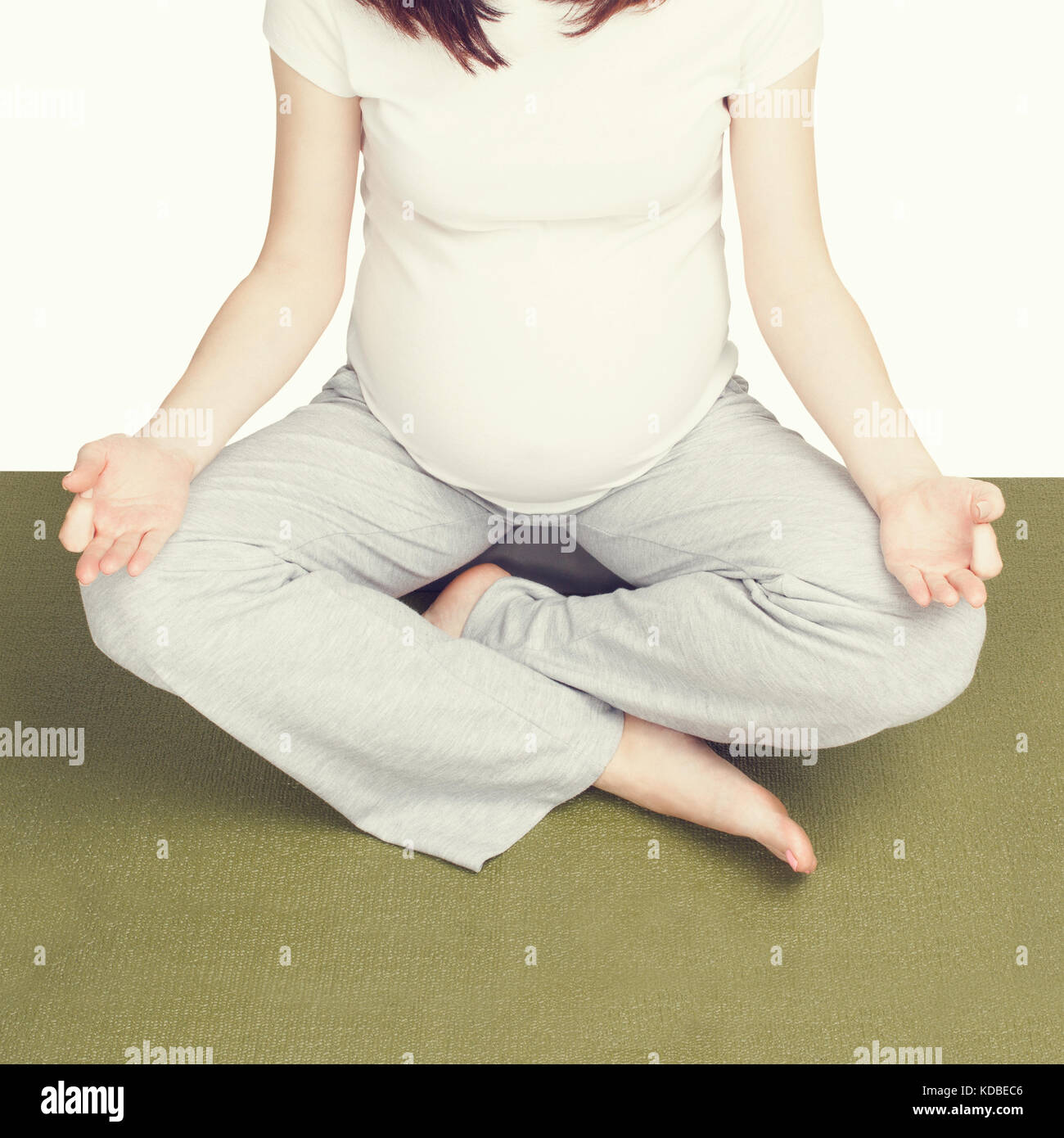 Schwangere Frau, meditieren Stockfoto