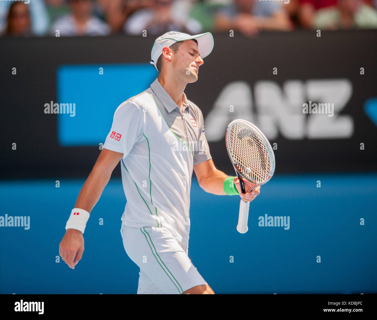 Verteidigung der Australian Open Champion Novak Djokovic (SRB) fand am l. Mayer (Arg) am dritten Tag, zweite Runde spielen. djokovic beat Mayer 6-0, 6-4, 6-4 bei m Stockfoto