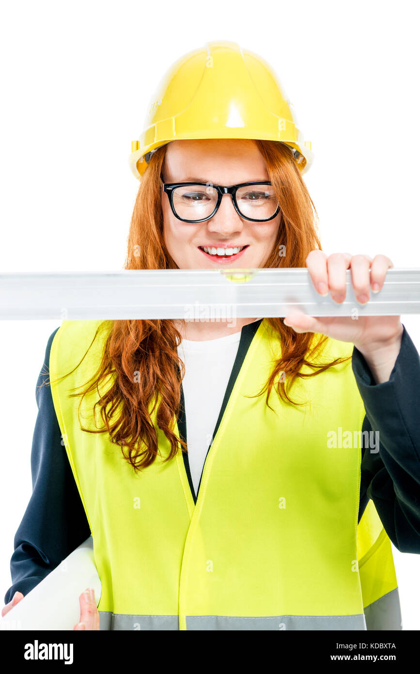 Porträt eines Ingenieurs Frau mit einem Lineal auf weißem Hintergrund Stockfoto