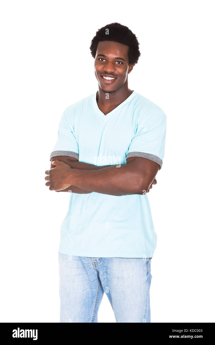 Portrait von Casual jungen afrikanischen Mann über weißem Hintergrund Stockfoto