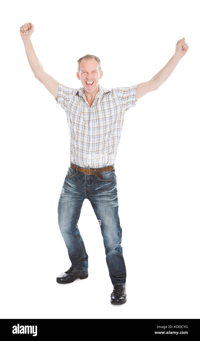 Aufgeregt reifer Mann mit Hand Over White Background Stockfoto