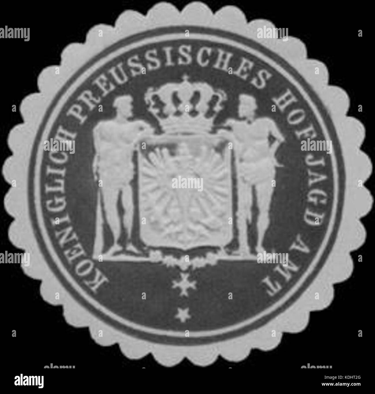 Dieser Stempel, eine Siegelmarke aus dem Königreich Preußen, wurde für amtliche jagdbezogene Korrespondenz verwendet. Sie trägt das Emblem des preußischen Königlichen Jagdamtes. Stockfoto