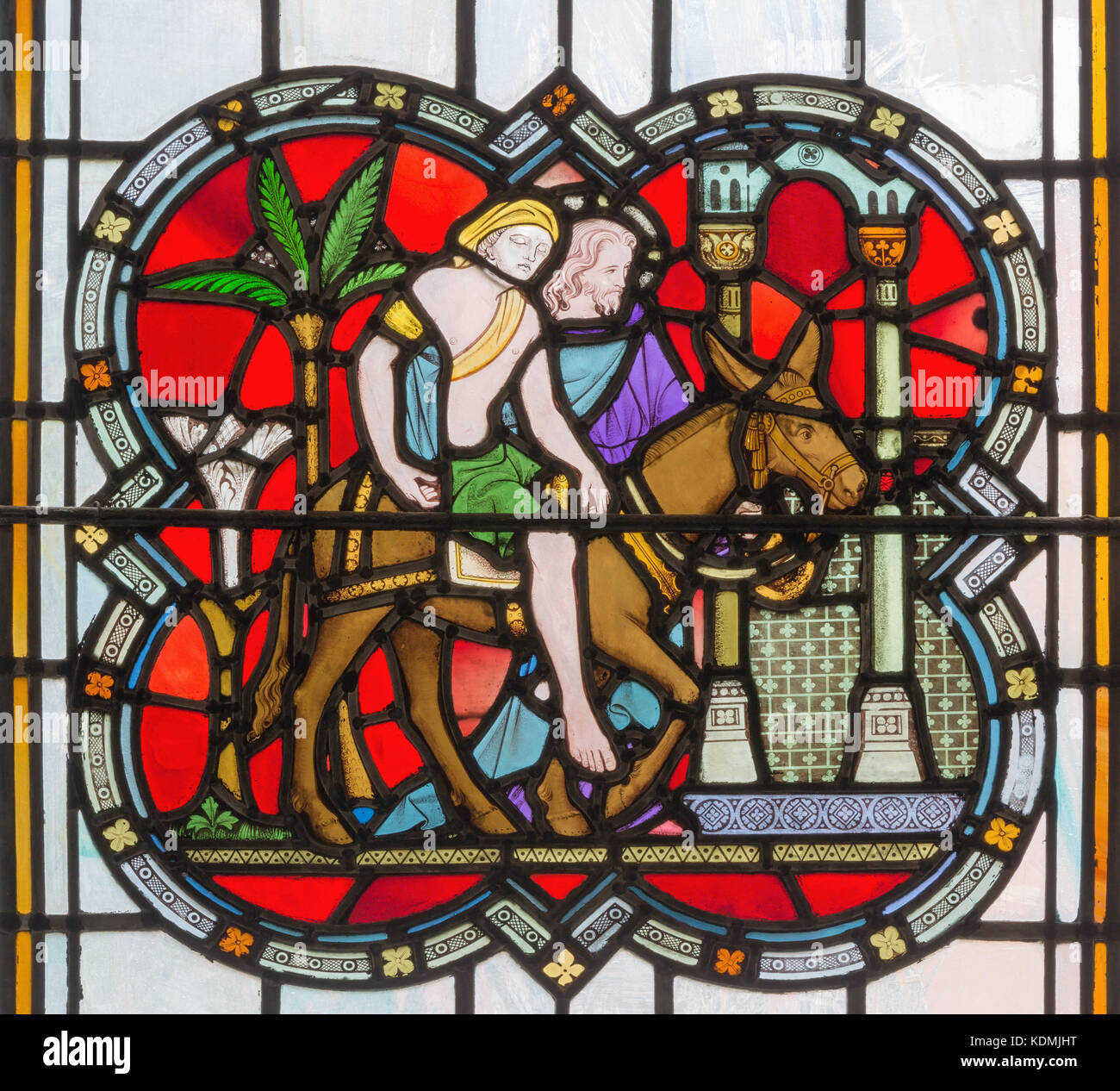 London, Großbritannien - 14 September, 2017: Das Gleichnis vom barmherzigen Samariter auf der Glasmalereien in der Kirche st. Michael cornhill Stockfoto