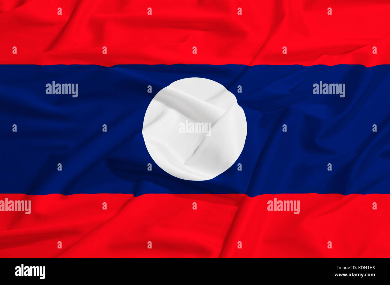 Laos Fahne auf einer Seide drapieren winken Stockfoto