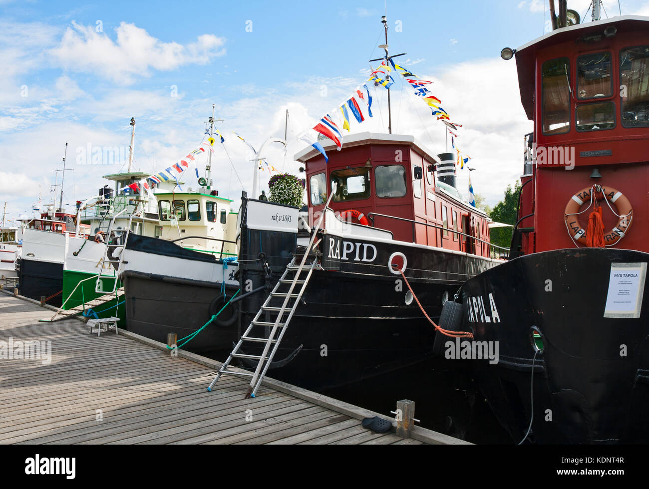 Lappeenranta, Finnland - 21. Juli 2013 - Regatta alter Motor Schiff. Boote am Anfang des letzten Jahrhunderts erbaut, am Pier in Lappeenranta günstig. Stockfoto