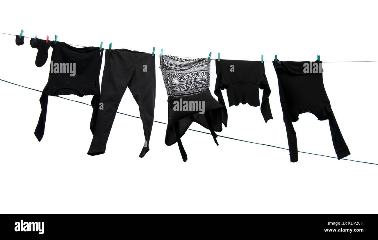 Shirts auf eine Wäscheleine. Eine Nahaufnahme Stockfoto