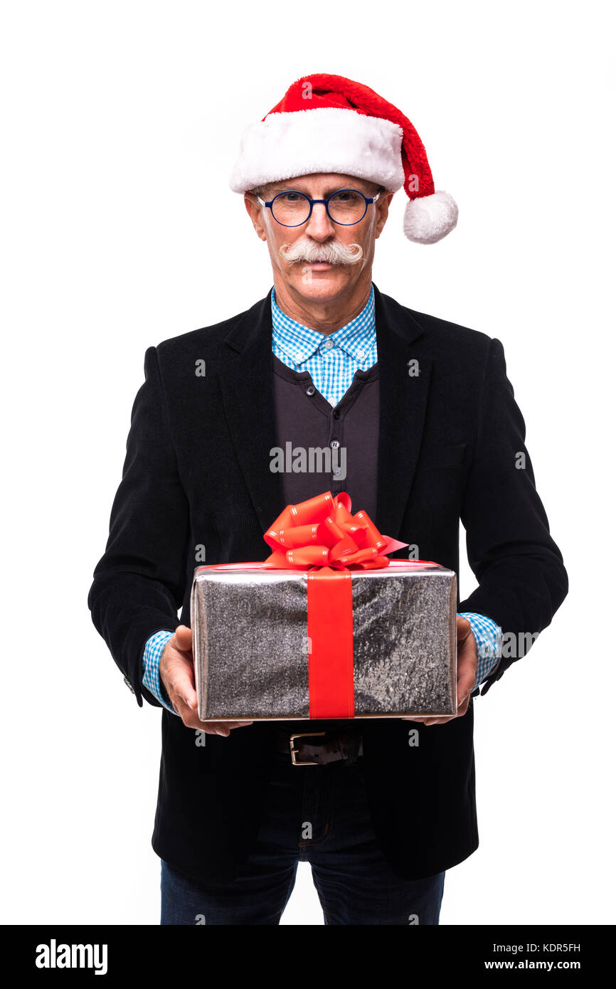 Senior Business Mann mit Santa Claus hat und Weihnachtsgeschenk Stockfoto