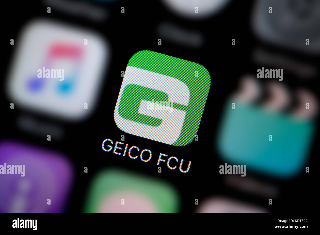Eine Nahaufnahme der Logo für die geico FCU App Symbol, wie auf dem Bildschirm eines Smartphones (nur redaktionelle Nutzung) Stockfoto