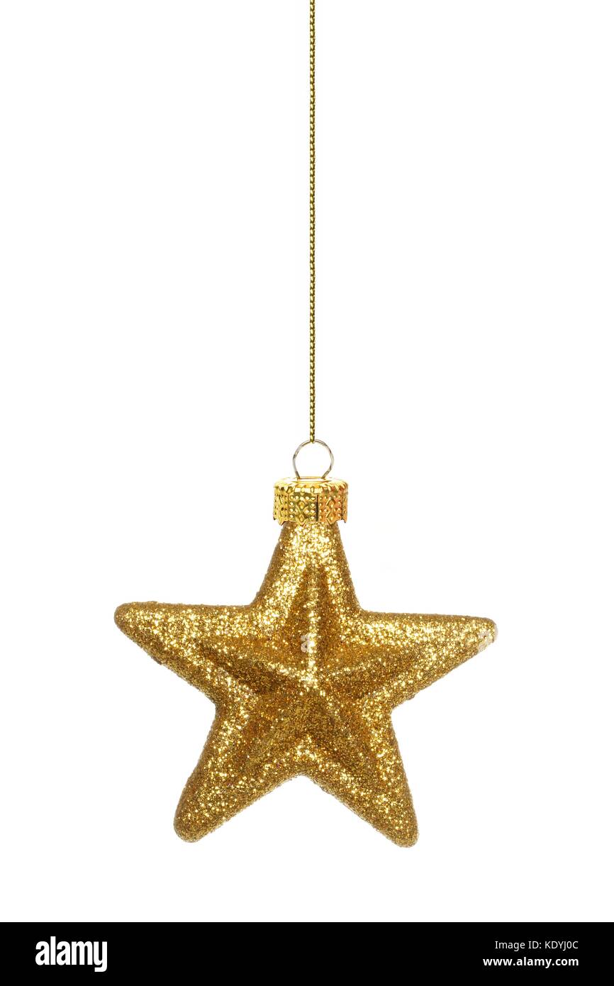 Single hängenden Gold Star christmas Ornament isoliert auf weißem Stockfoto
