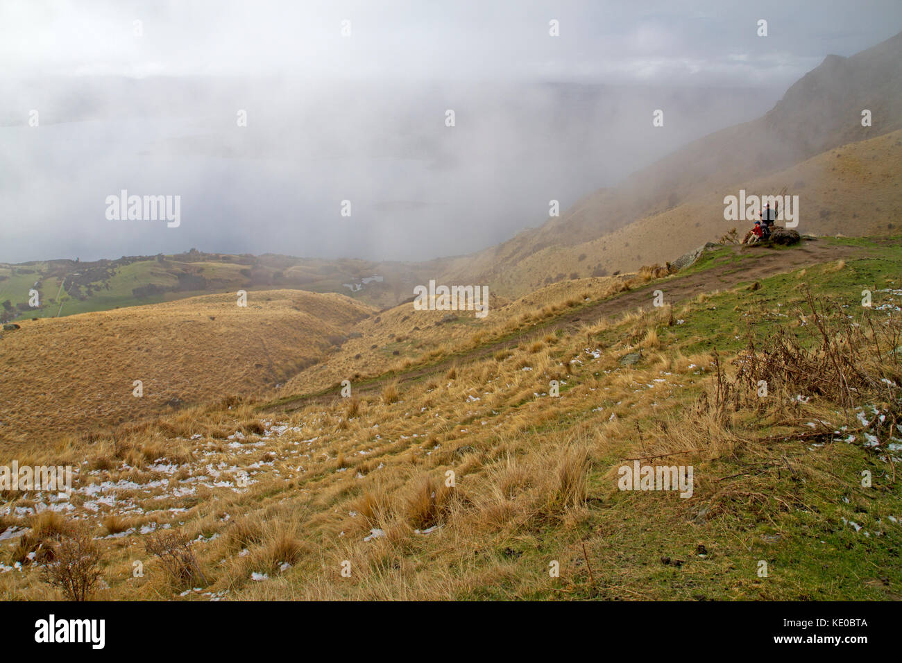 Wanderer auf dem Weg nach roys Peak, Wanaka Stockfoto