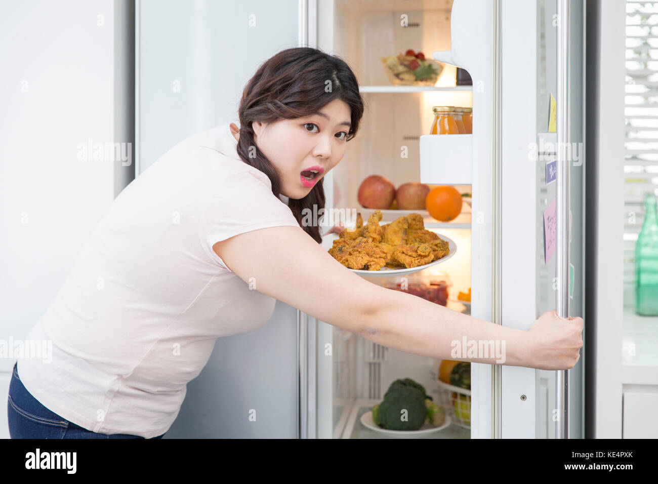 Lebensstil von jungen fette Frau Stockfoto