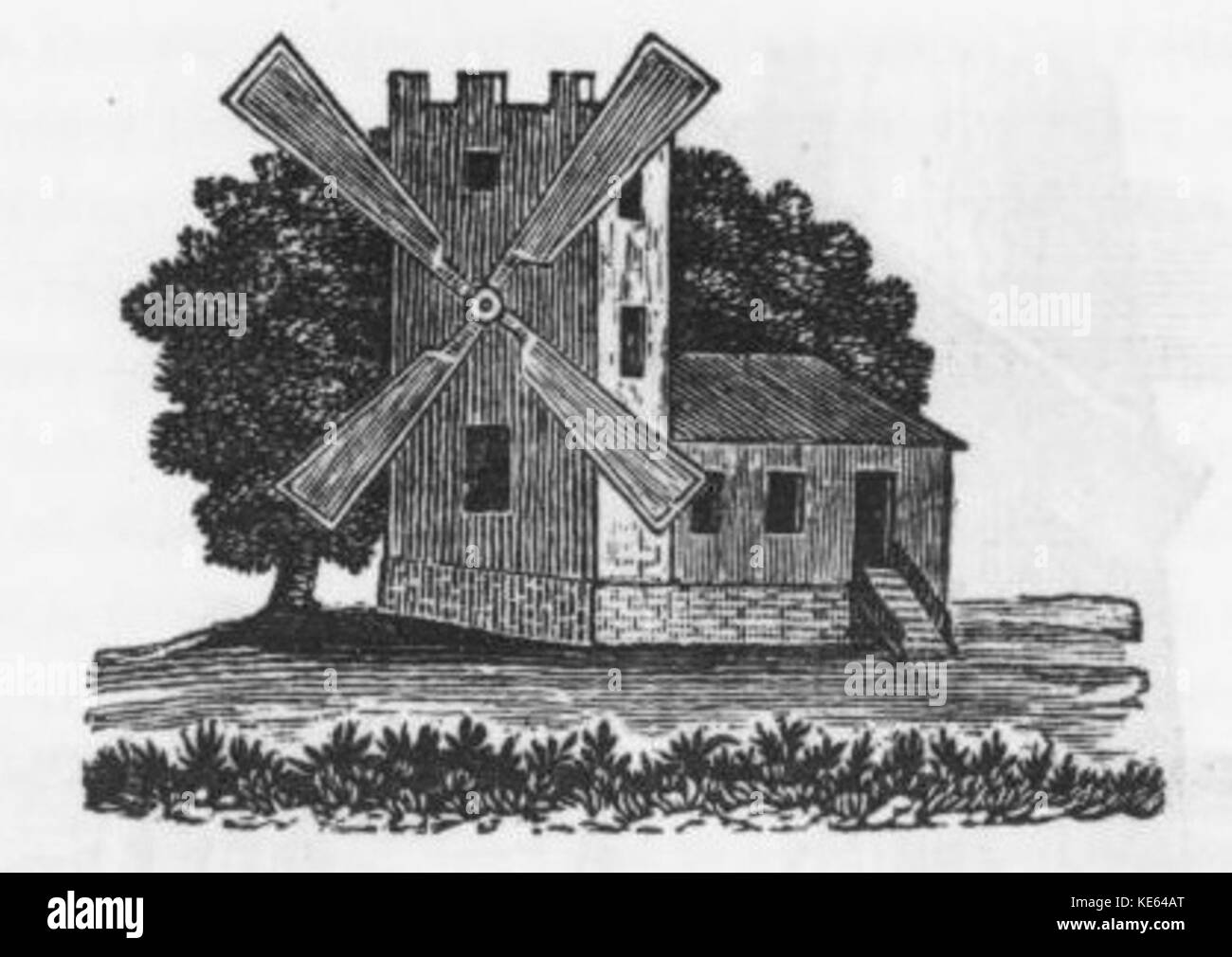 Diese Abbildung zeigt eine traditionelle Windmühle, die ihre historische Bedeutung in der Agrar- und Industriegeschichte als Werkzeug zur Nutzung der Windenergie unterstreicht. Stockfoto