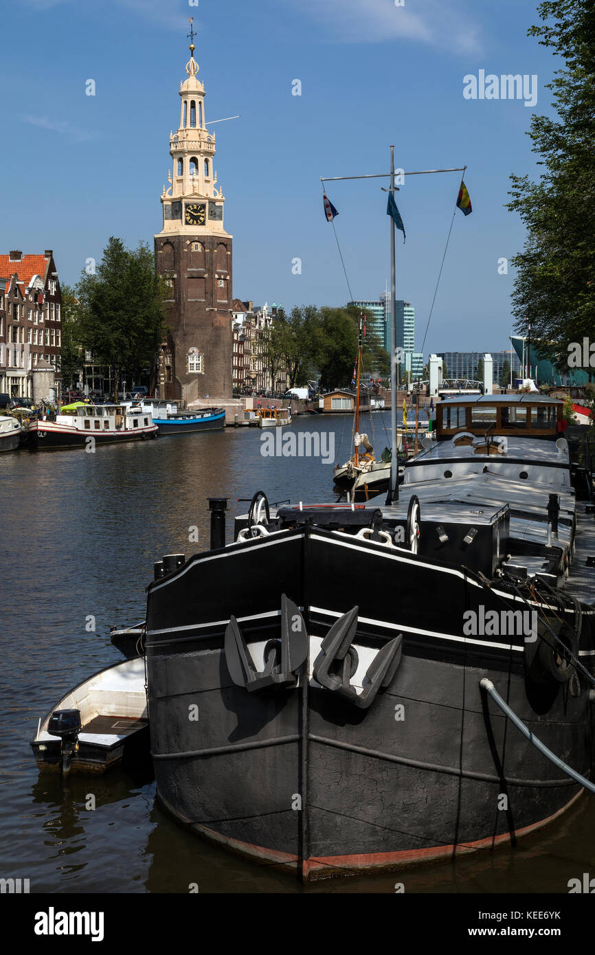 Die montelbaanstoren, ein Turm am Ufer der Oudeschans Gracht in Amsterdam in den Niederlanden. Ursprünglich war es Teil der Stadtmauer und Termine fr Stockfoto