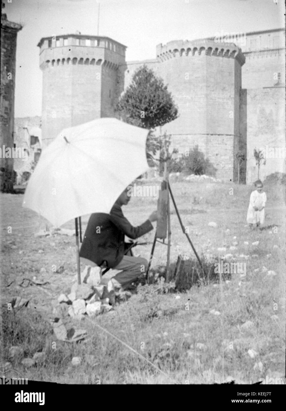 Baldomer Gili Roig. Baldomer Gili Roig pintant davant La Muralla de Poblet, C. 1900 Stockfoto