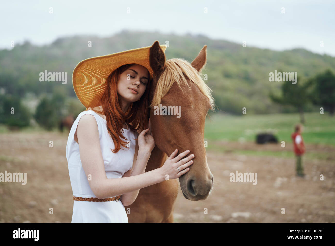 Frau Petting Pferd Stockfoto