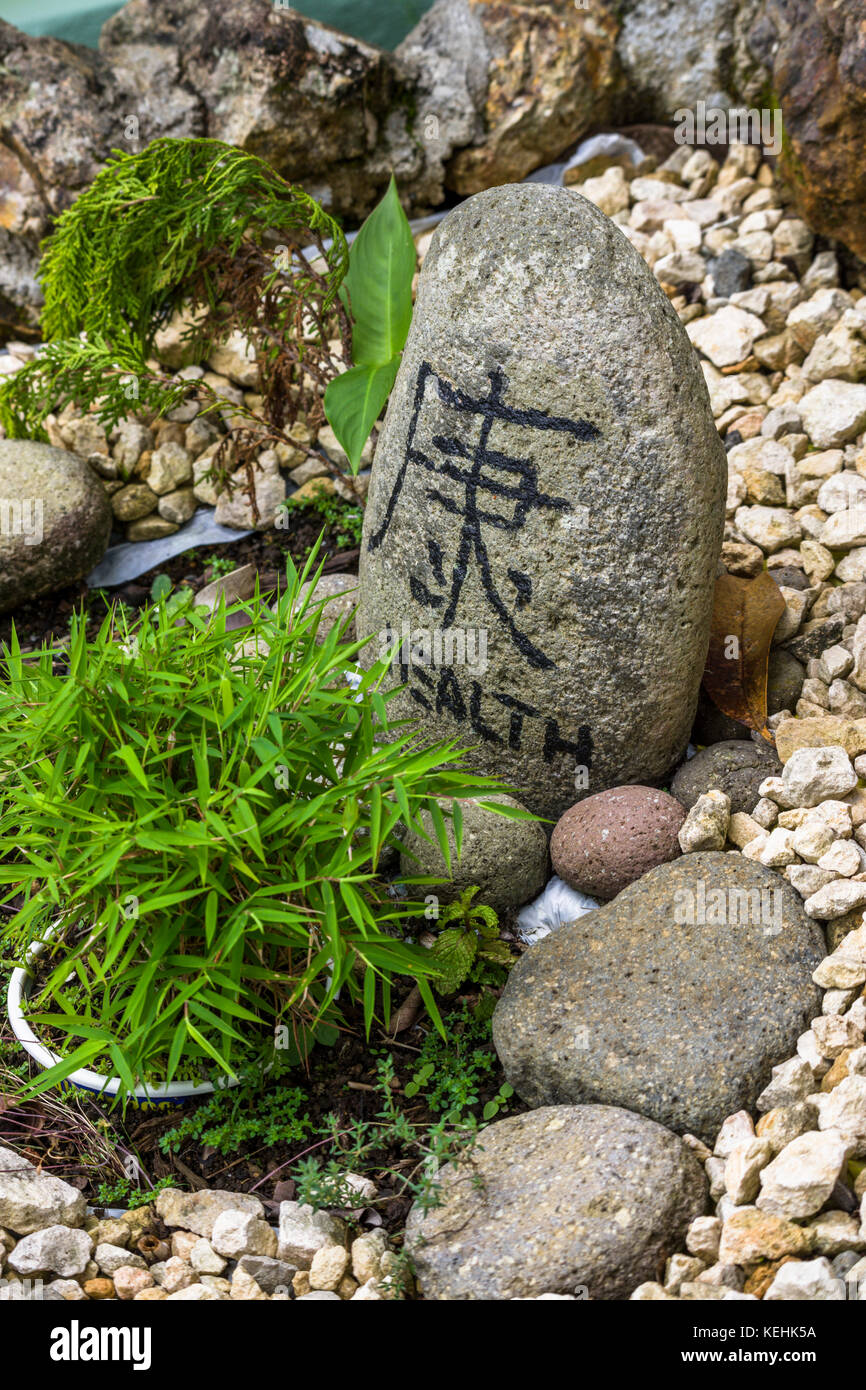 Garten Ideen Zen Stone Garten mit Symbol Stockfoto