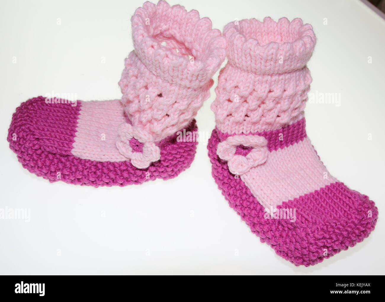 Mädchen Baby Socken, Strümpfe, gestrickt in Rosa, Rosa Stockfoto