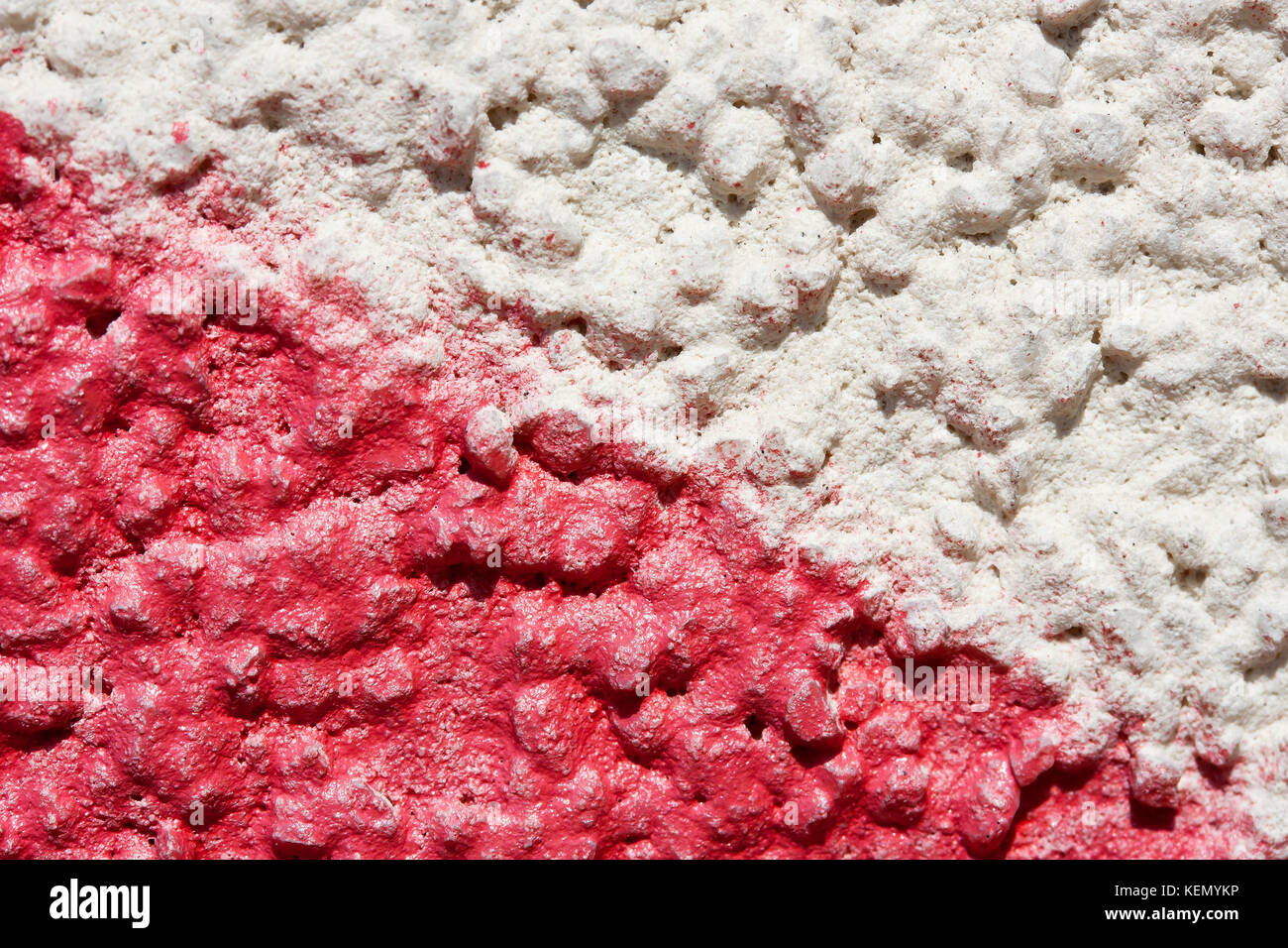 Farbige industriellen Hintergrund. Alte weiß-rote Wand. Stockfoto