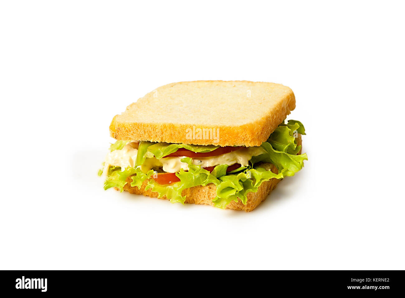 Sandwich mit Huhn und frische Salate und weißes Brot auf weißem Hintergrund Stockfoto