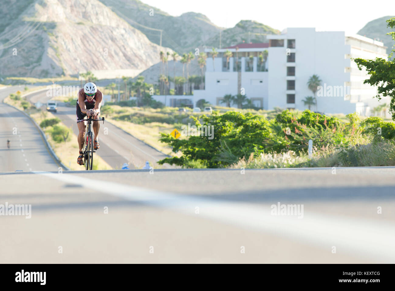 Profesional Triathleten auf der Bike Stage des Los Cabos Iron man 2015 in Los Cabos, Baja California Stockfoto