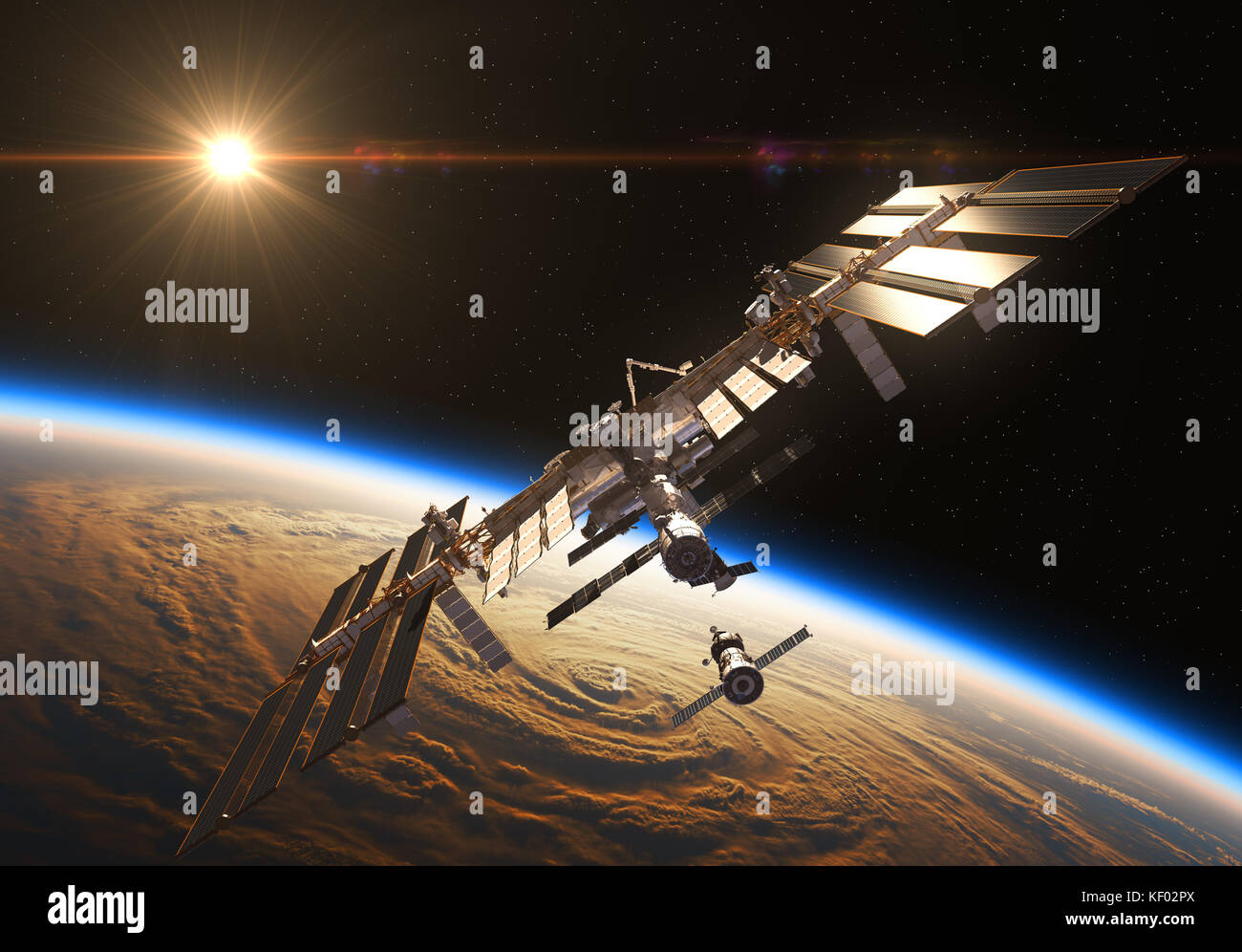 Internationale Raumstation und Raumfahrzeuge im Hintergrund der aufgehenden Sonne Stockfoto