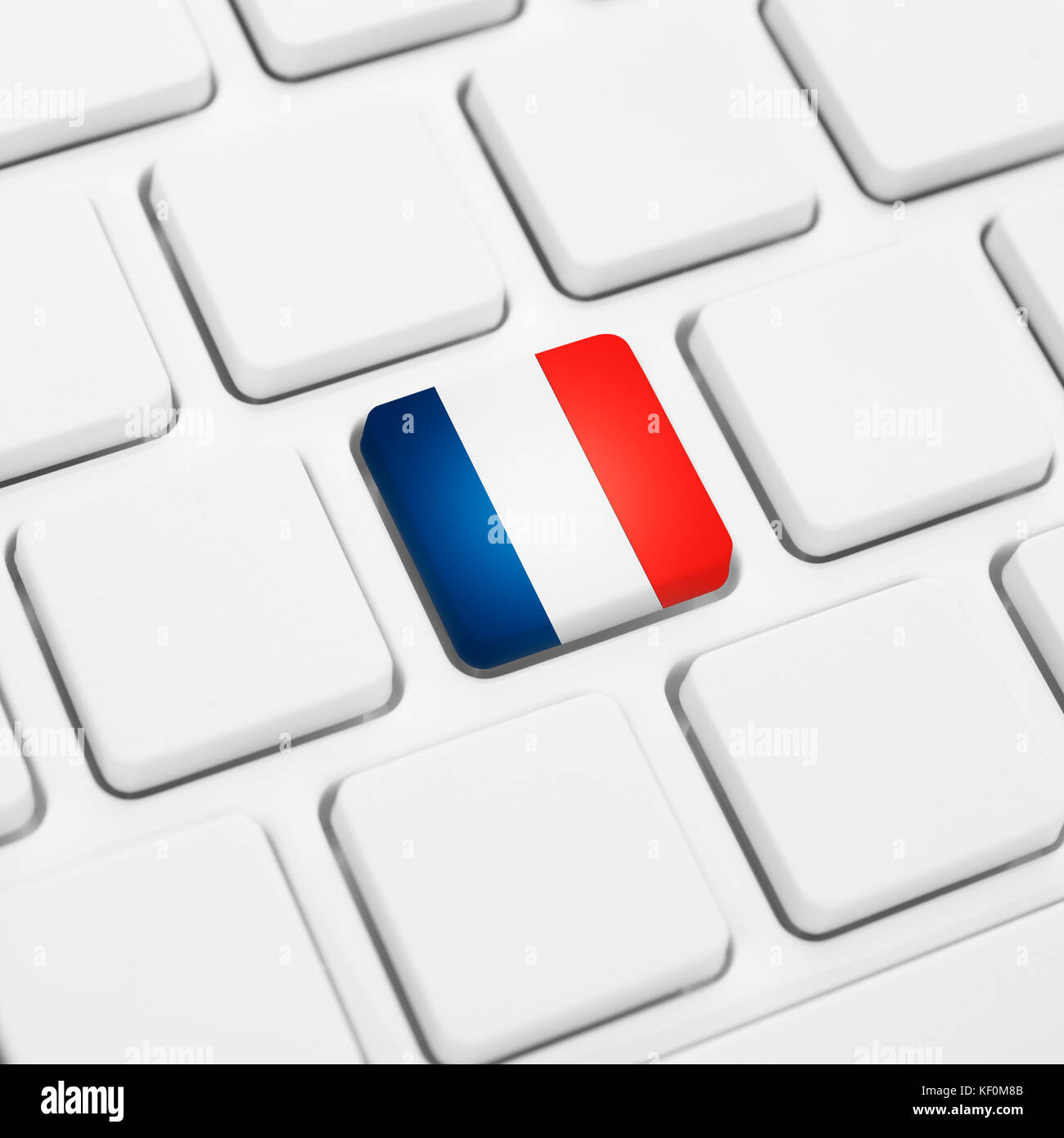 Französische Sprache oder Frankreich web Konzept. nationalflagge Schaltfläche oder Taste auf weiße Tastatur Stockfoto