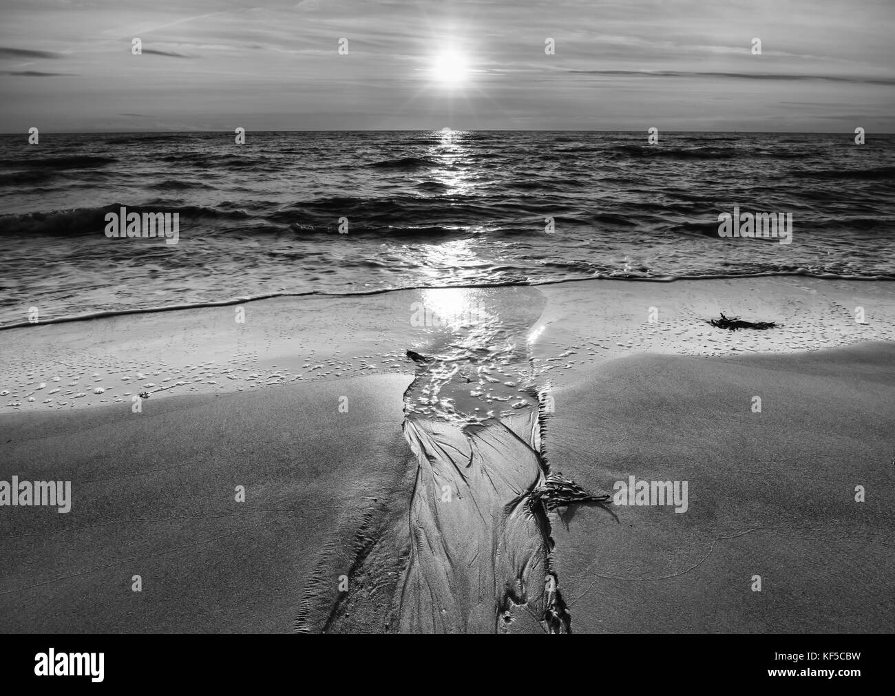 Sand stream und Sonnenuntergang - cumbria Großbritannien Stockfoto