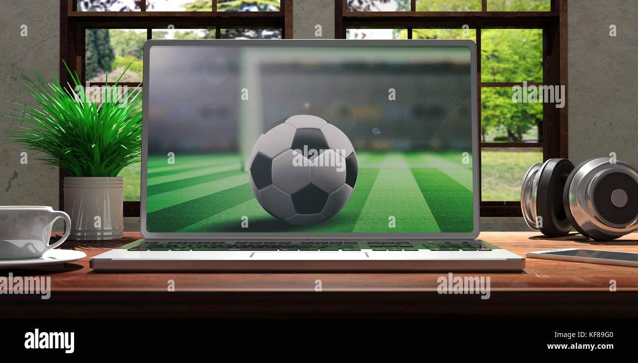 Laptop mit Fußballbildschirm und silberfarbenem Bildschirm auf einem Holzschreibtisch, Zimmer mit Fenster mit Blick auf die wunderschöne, verschwommene Natur. 3D-Abbildung Stockfoto