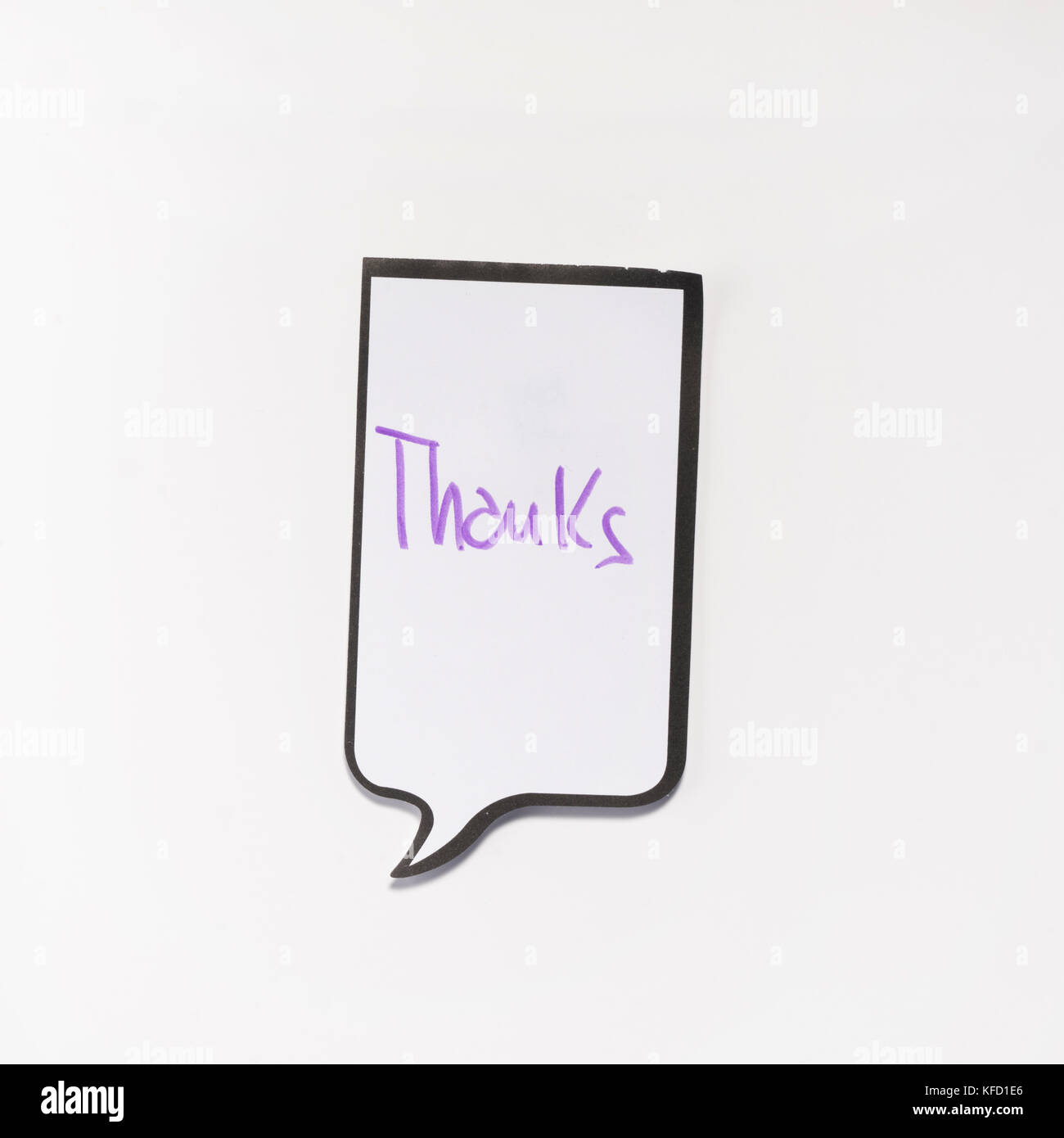 Eine weiße Memo Pad mit der Form eines Comics mit Dank die Inschrift '' Stockfoto