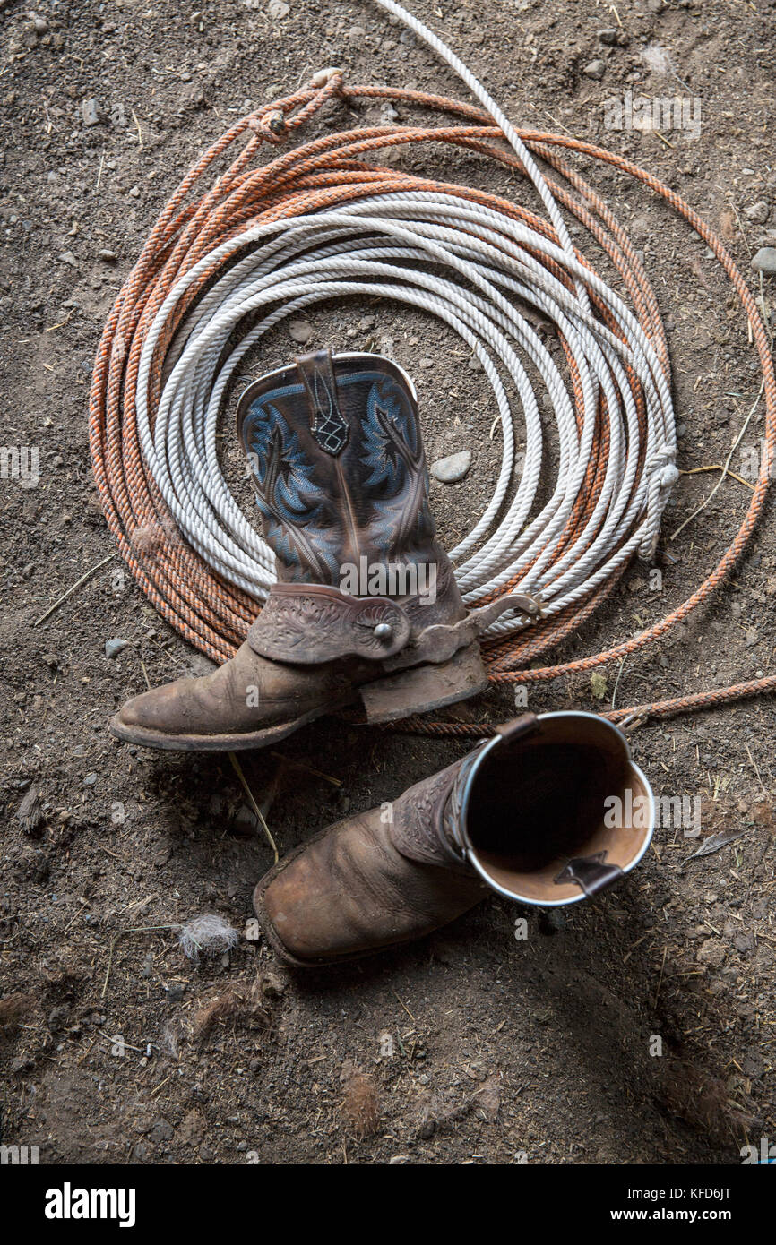 USA, Oregon, Enterprise, die Stiefel und das Lasso von Cowboy Cody Ross auf der Snyder Ranch im Nordosten von Oregon zwischen Enterprise und Joseph Stockfoto