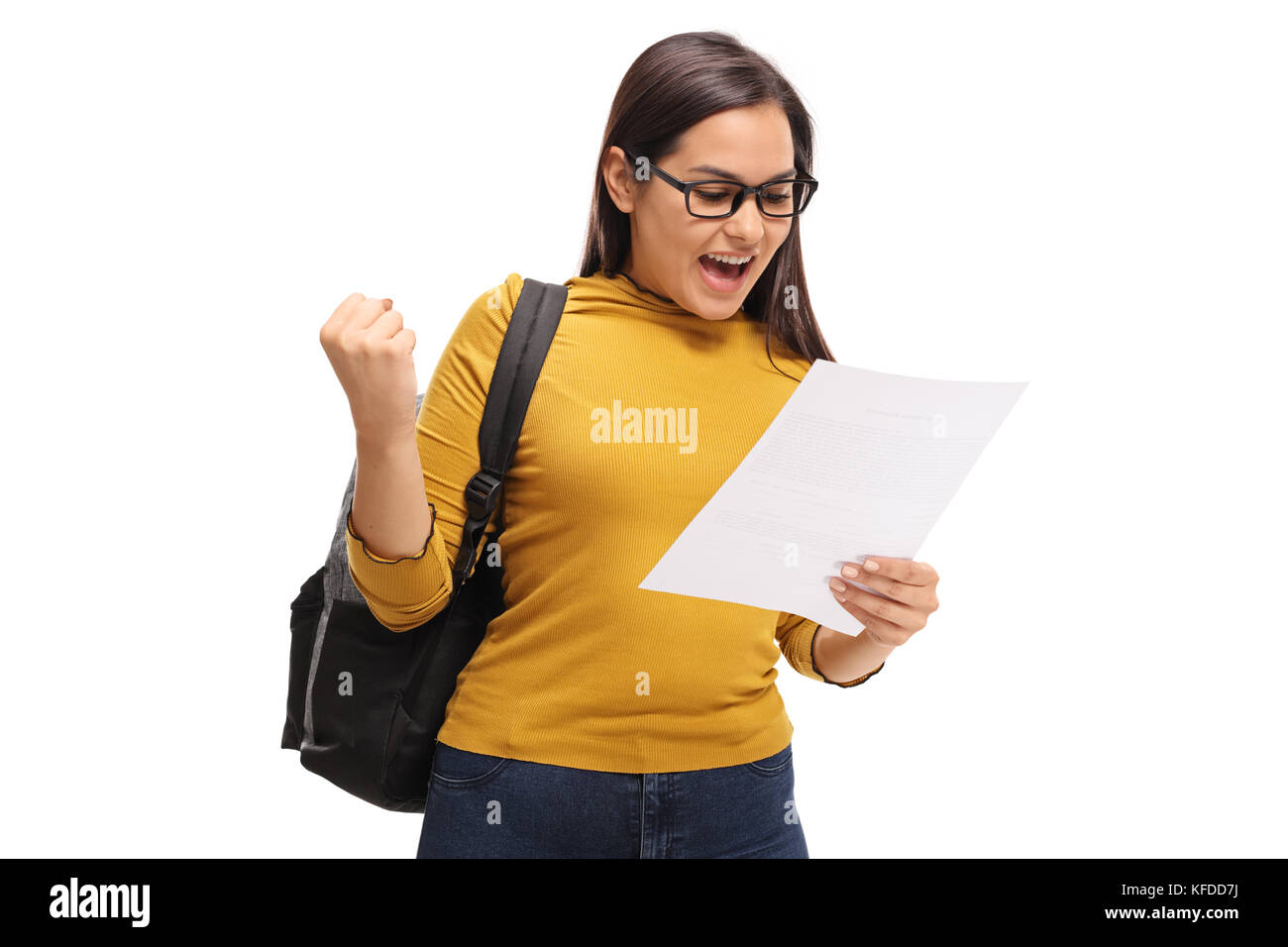 Weibliche Teenager Student auf eine Prüfung und Gestik Glück auf weißem Hintergrund Stockfoto
