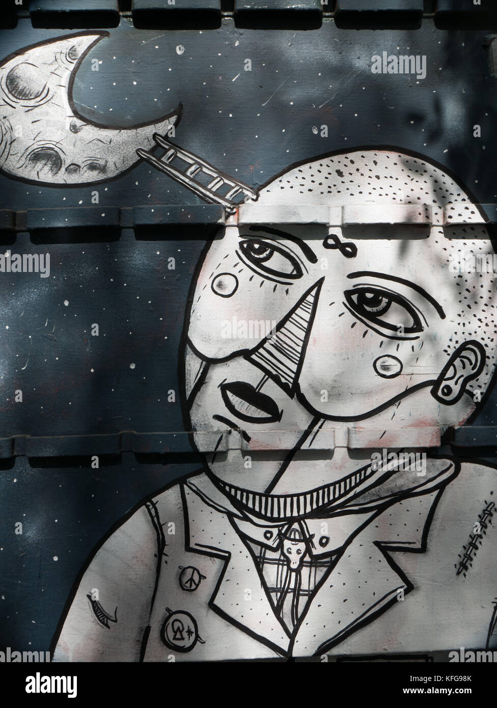 Nahaufnahme Foto Poster auf der Wand zeigt eine schwarze Linie zeichnen Mann an einem Halbmond mit einer Leiter seinen Kopf verbinden mit dem Mond. Stockfoto
