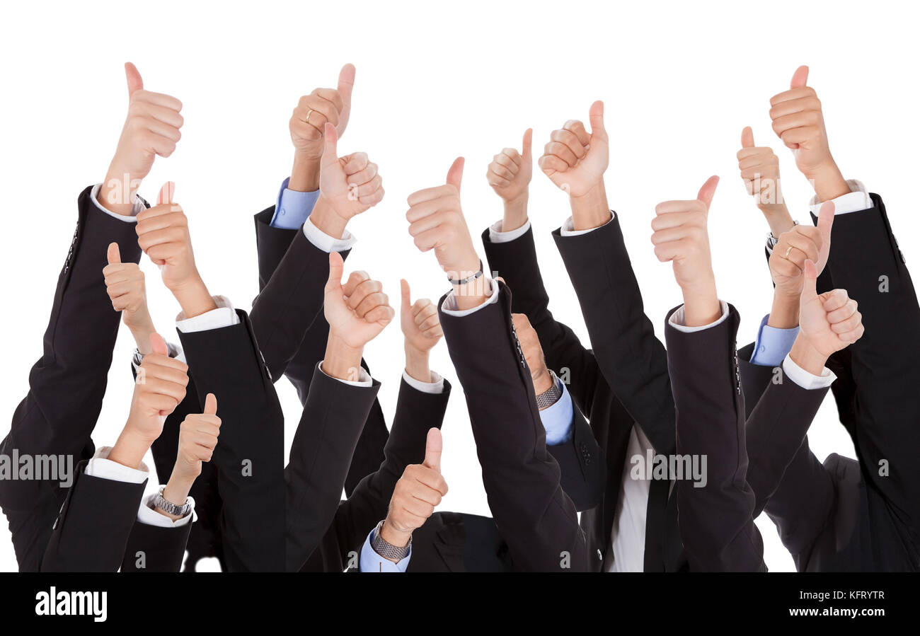 Ein Bündel von erhobenen Händen von Geschäftsleuten. isoliert auf weißem Stockfoto