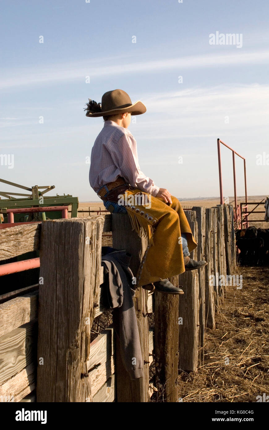 Ein junger Cowboy Chaps und COWBOYHUT Stockfoto