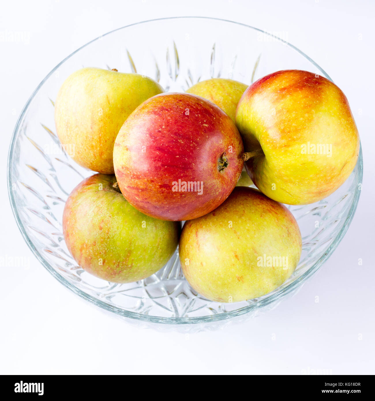Der britische Cox Äpfel in einem Glas Obstschale Stockfoto