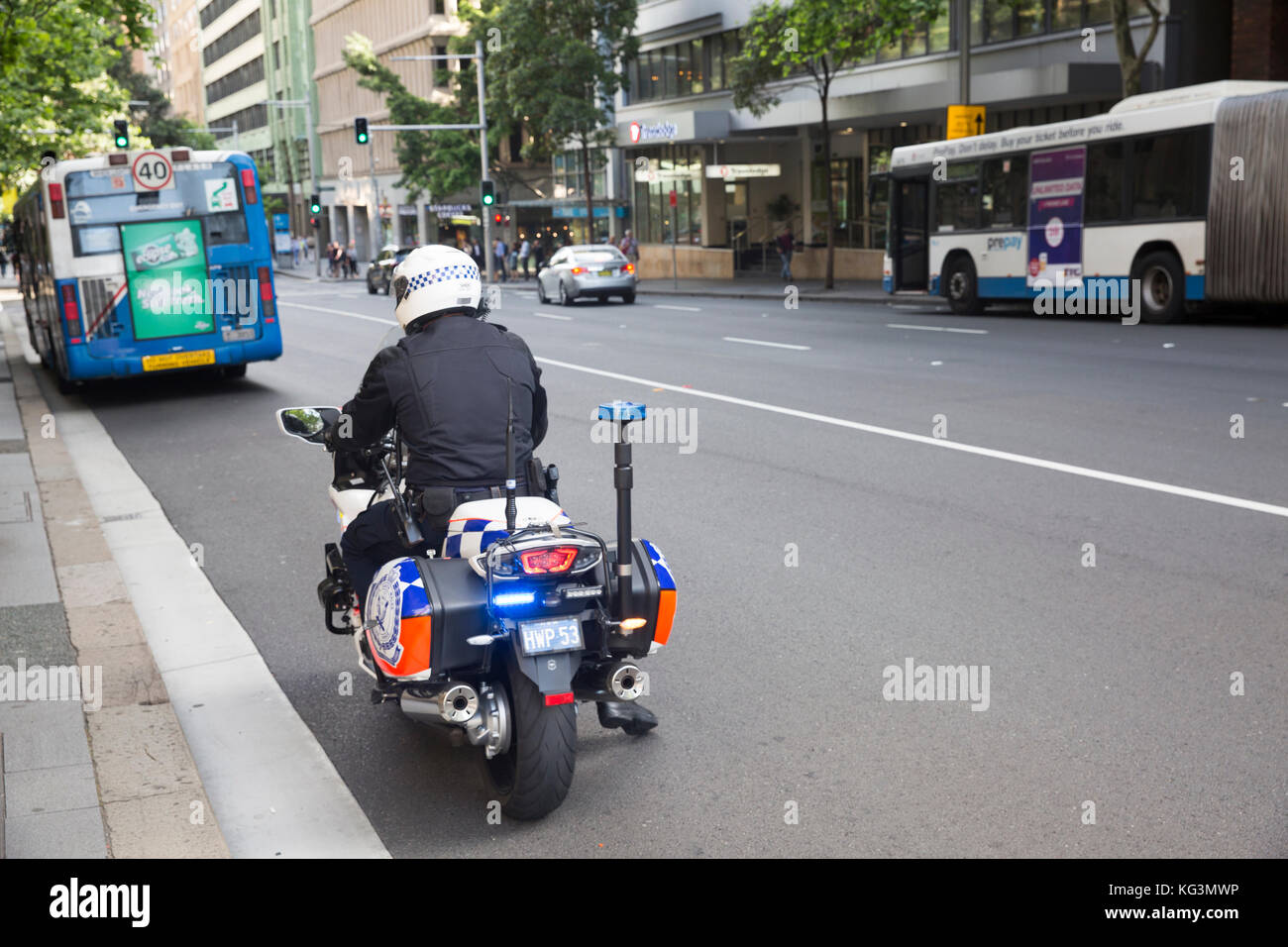 New South Wales Polizist Polizisten auf seinem Polizei Motorrad in die Innenstadt von Sydney, Australien Stockfoto