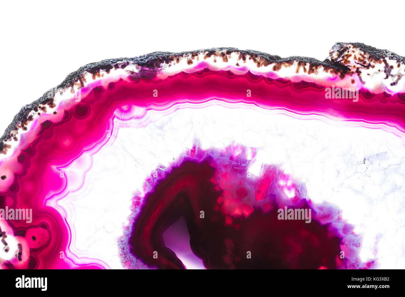 Zusammenfassung Hintergrund - rosa Achat mineral Querschnitt auf weißem Hintergrund Stockfoto