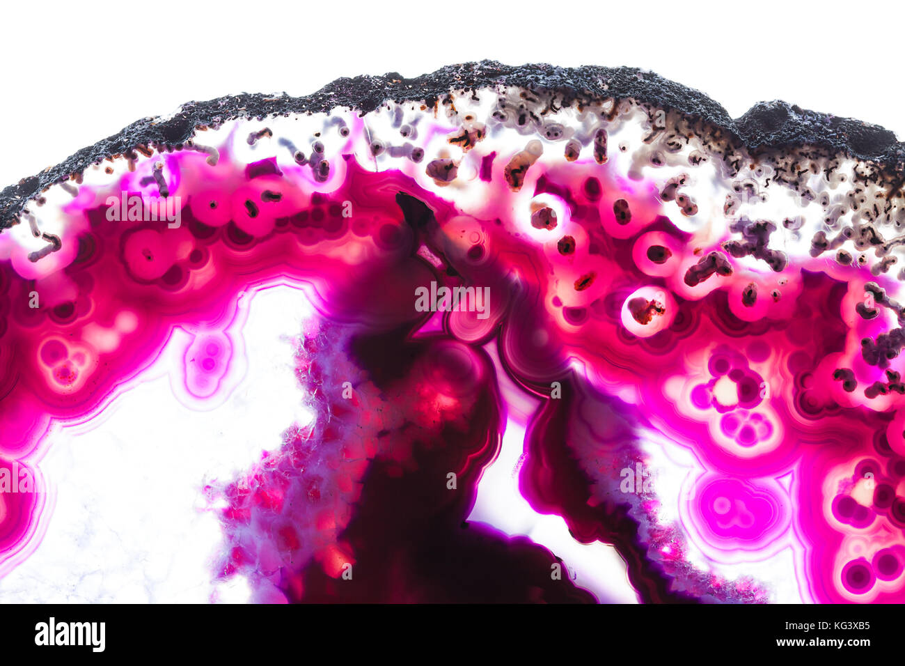 Zusammenfassung Hintergrund - rosa Achat mineral Querschnitt auf weißem Hintergrund Stockfoto
