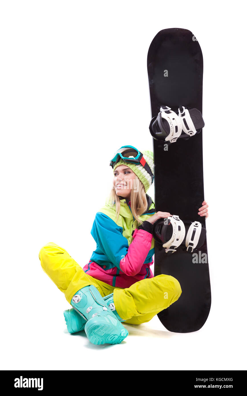 Hübsche junge Frau in Ski Snowboard Outfit halten Stockfoto