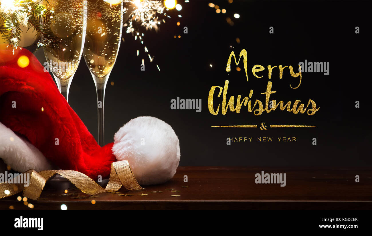 Frohe Weihnachten und guten Rutsch ins neue Jahr; Champagner und Santa hat Stockfoto