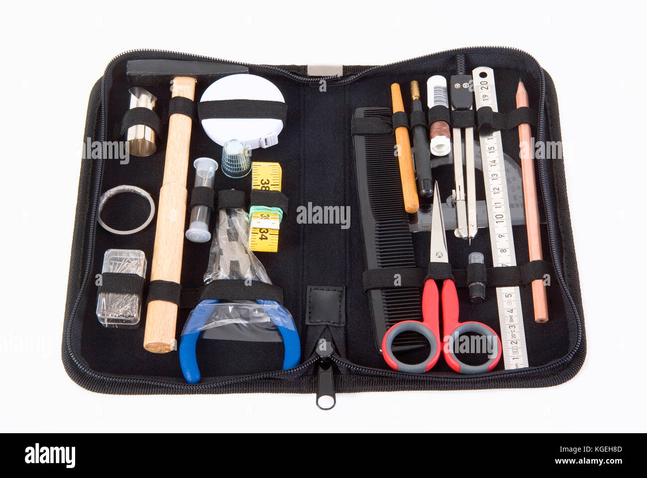 Satz von Tools für professionelle perückenmacher in einer Ledertasche Stockfoto