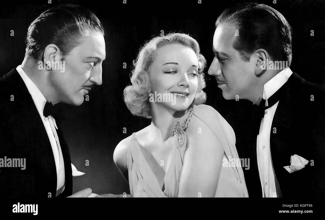 ARSENE-LUPIN KEHRT 1938 MGM-Film von links zurück: Melvyn Douglas, Virginia Bruce, Warren William Stockfoto