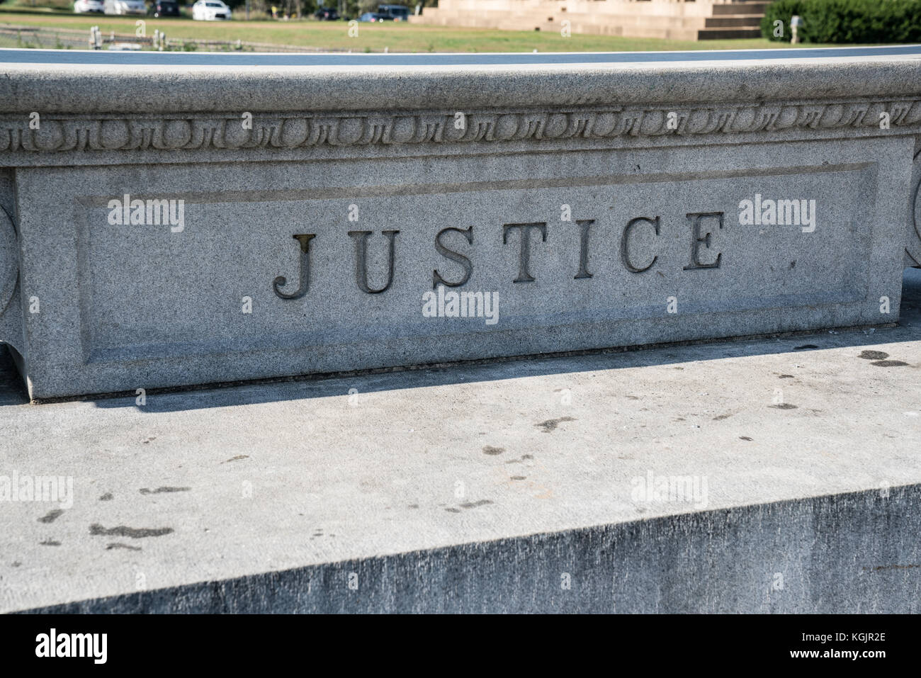 Gerechtigkeit Zeichen eingraviert in Stein Stockfoto