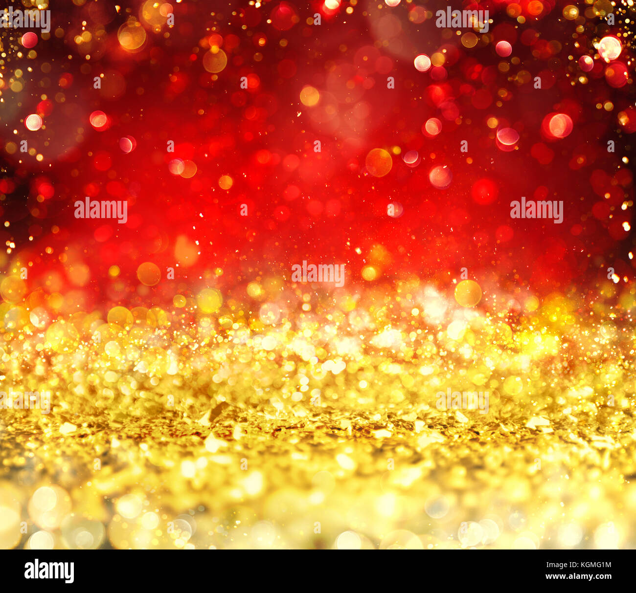Weihnachten leuchtende Gold und Rot hinterlegt Stockfoto