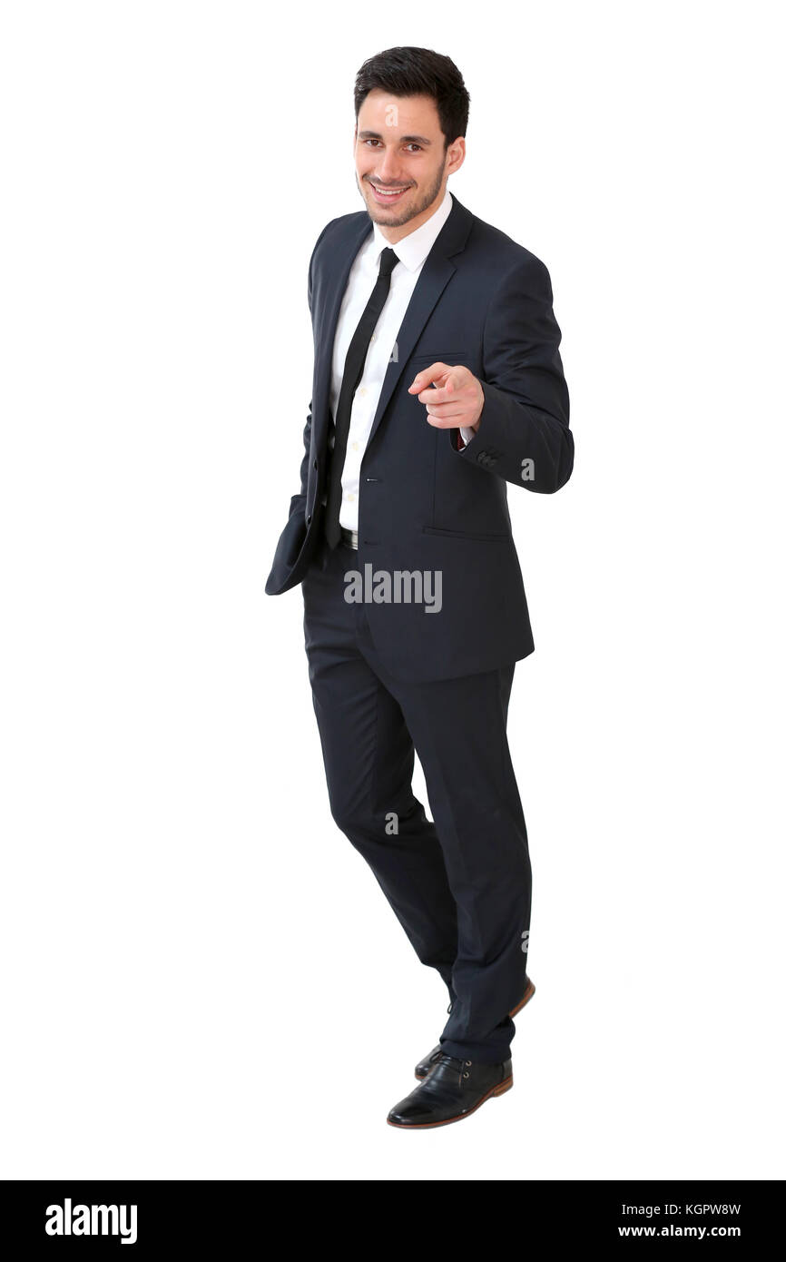 Junge Unternehmer im dunklen Anzug an Kamera zeigen Stockfoto