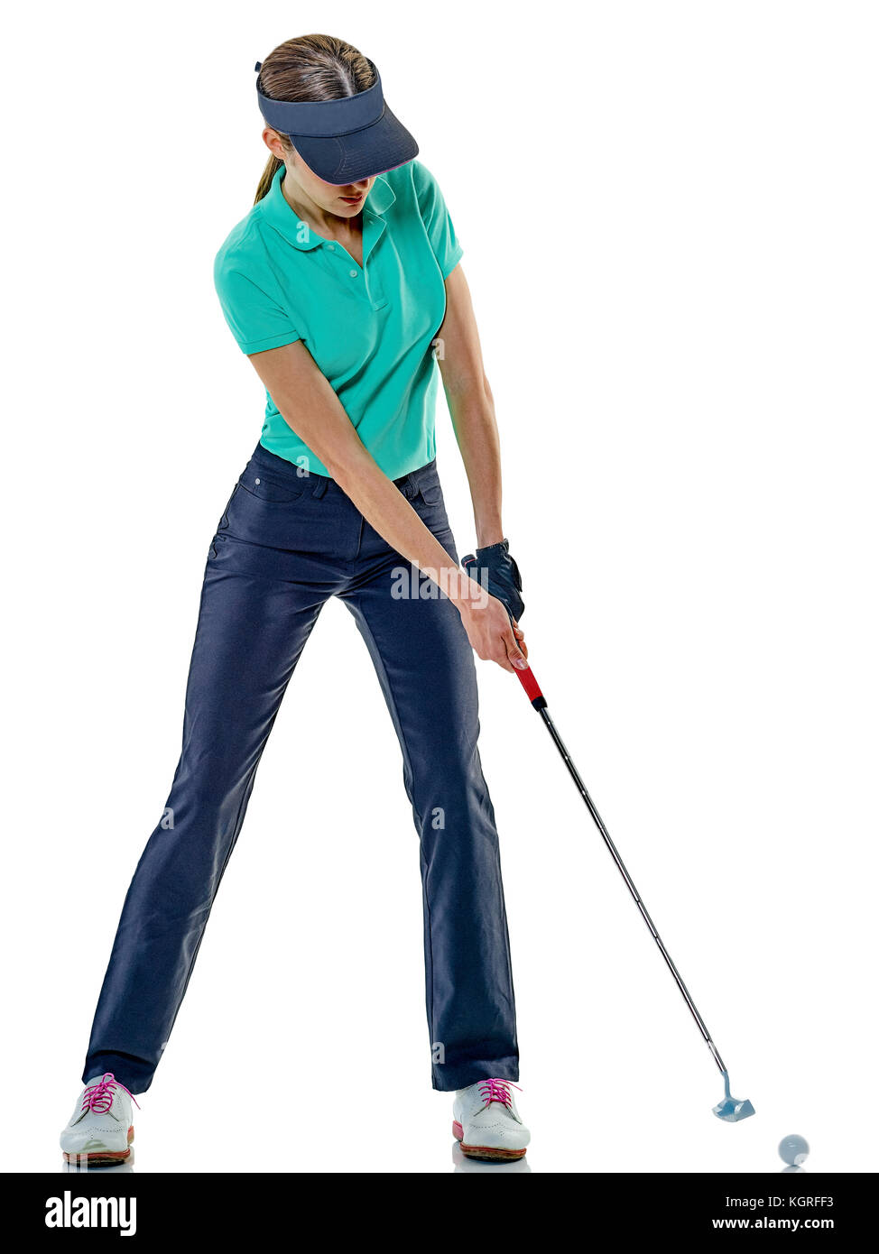 eine Kaukasische Frau Frau Golfer Golfen im Studio isoliert auf weißem Hintergrund Stockfoto