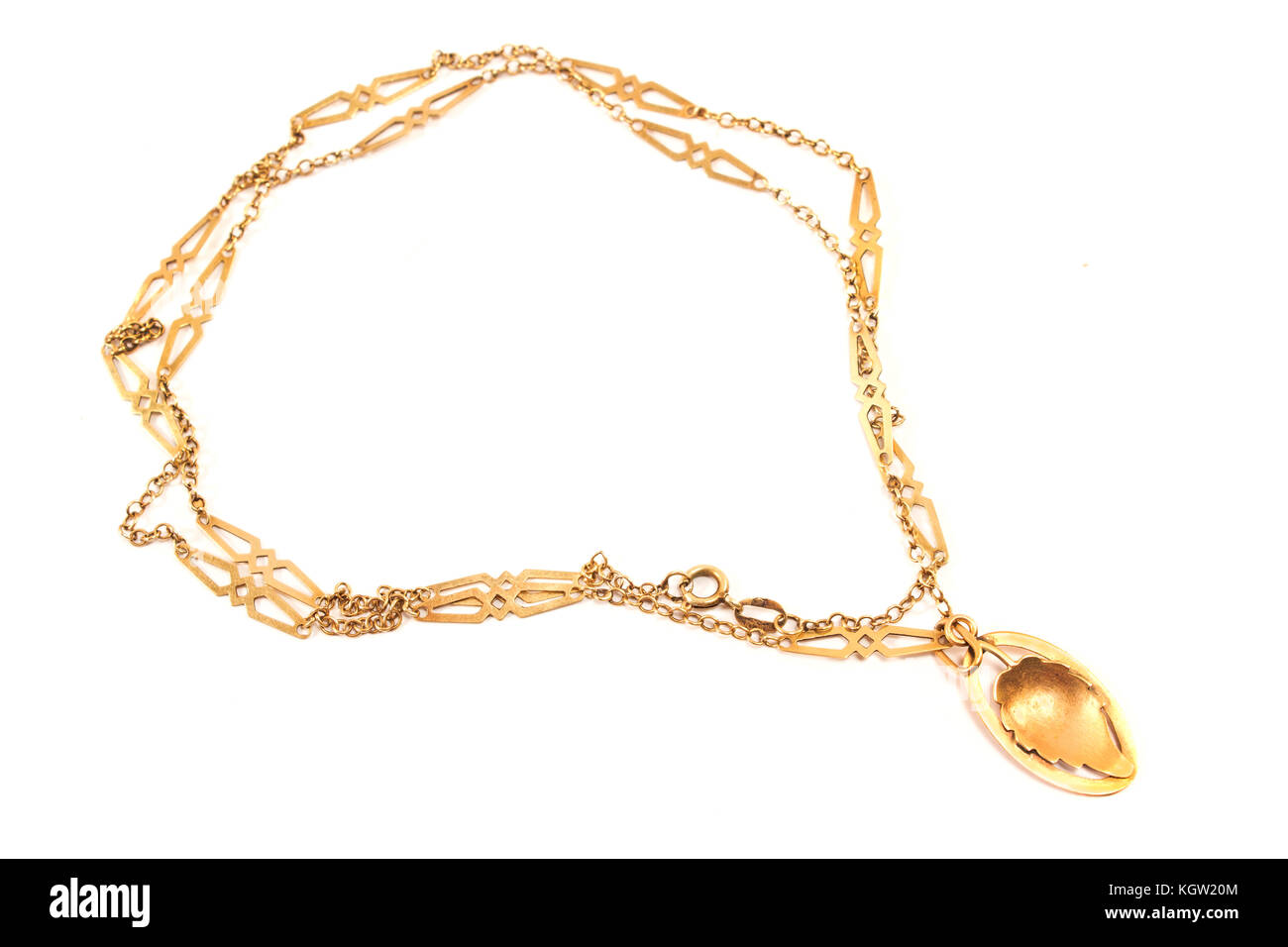 Goldene Halskette mit Blatt Anhänger isoliert auf weißem Stockfoto